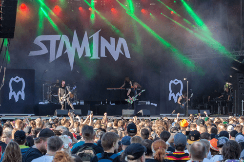 Image of a Finnish band called Stam1na with their 10 x 5 meter (32.8 x 16.4 ft) size backdrop in the background