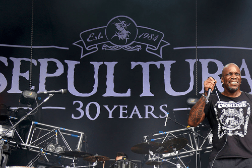 Image of a Brazilian heavy metal band called Sepultura with their 11 x 7 meter (36 ft x 22.9 ft) size backdrop in the background